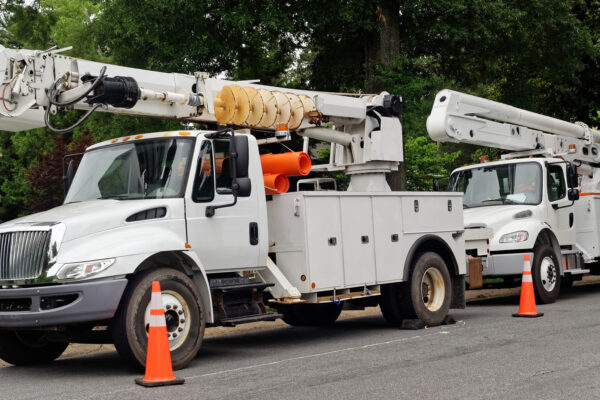 two bucket trucks