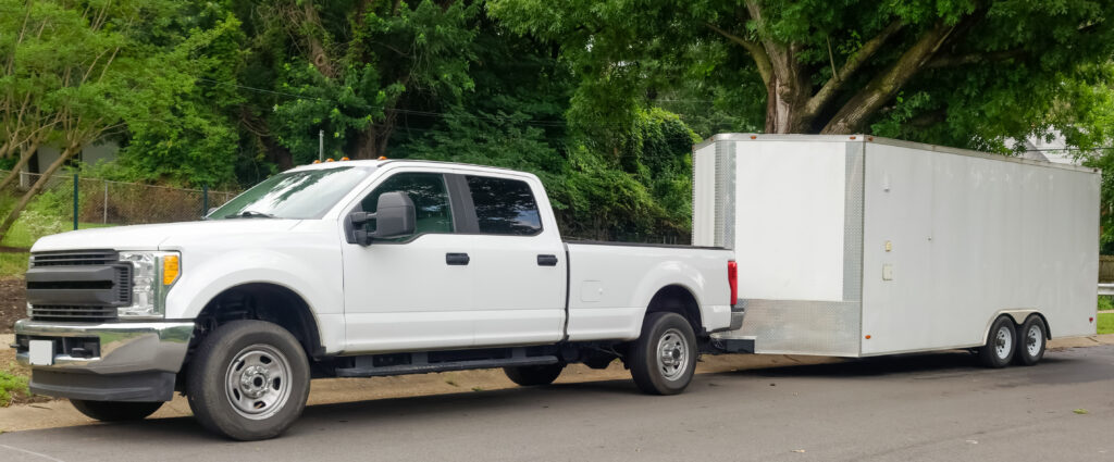 pickup truck pulling a trailer