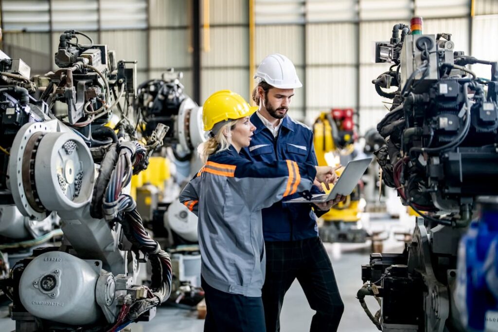 Business owner reviews newly financed machinery equipment
