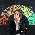 Credit score gauge concept with pensive businesswoman on