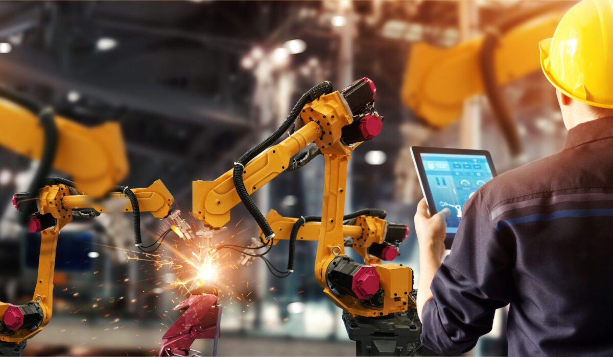 Engineer check and control welding robotics automatic arms machine