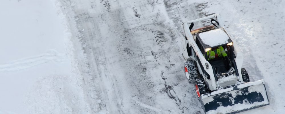 Skid Steer removing snow